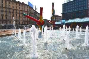 Nadia Mikushova. View to the fountain of the monument "Thread and needle" dedicated to the three lines of the Milan underground: red, green and yellow.