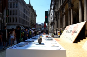 Nadia Mikushova. A view to the EXPO2015 presentations in the Mercanti street in Milan.