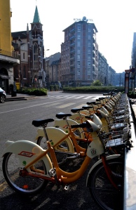 Nadia Mikushova. A view to one of the numerous citybike parkings in Milan.