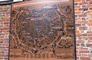 Nadia Mikushova. A view to the ancient Milan city map exposed on one external wall of the Castello Sforzesco.