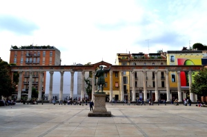 Nadia Mikushova. A view to the Roman emperor Costantino I monument and the Columns of San Lorenzo in Milan.